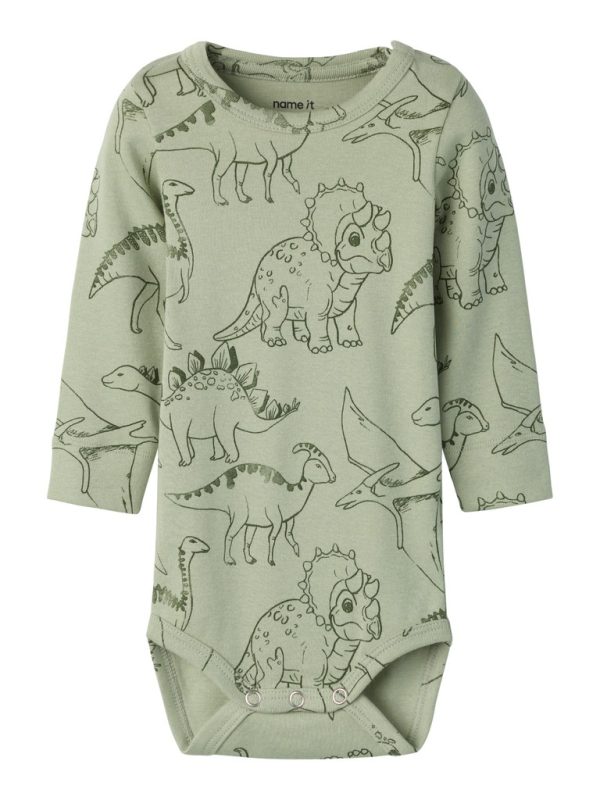 NAME IT NbmHinos body dinosaurus Swamp